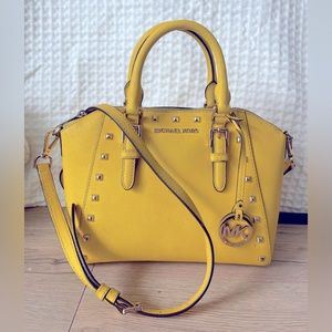 Studded yellow Michael Kors Cross body and handbag